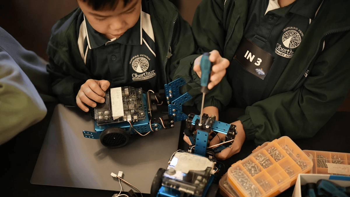 Students building and coding robots